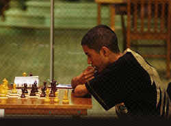 Quebec Open Championship, Montreal, 2009 by photographer Richard BÈrubÈ. Copyright 2009 by Shiyam Thavandiran, FÈdÈration quÈbÈcoise des Èchecs